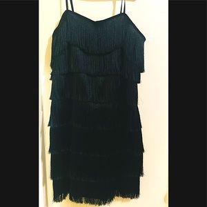 If you have a few pounds more and you want to hide them this dress is perfect